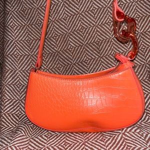 Orange hand bag